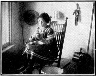 Woman Peeling Potatoes